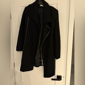 Trendy black winter coat. Zip front. Like new. Small.